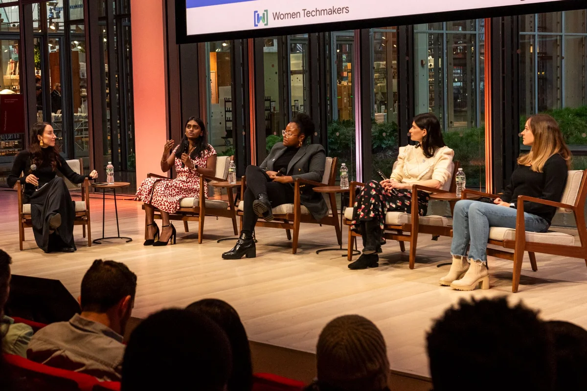 A photo of a group of women talking. Seated from left to right: Natalia Villalobos, Kavya Kopparapu, Karla Palmer, Jaclyn Rice Nelson and Kaitlin Ardiff.